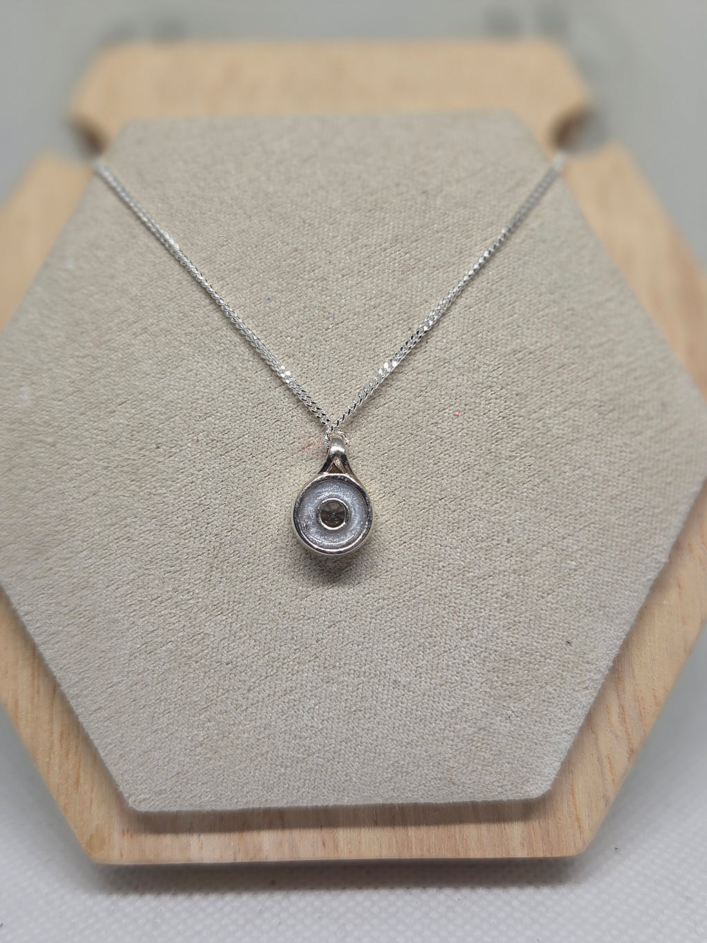 Secretly Set Circle Pendant