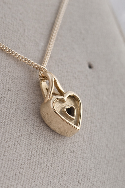 Secretly Set Heart 9K Pendant