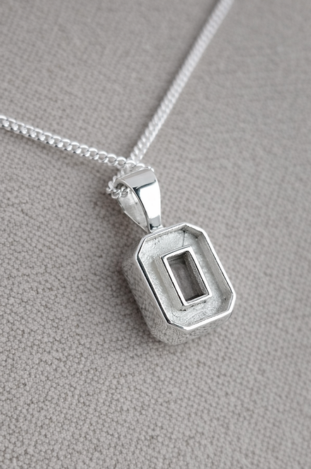 Secretly Set Emerald Pendant