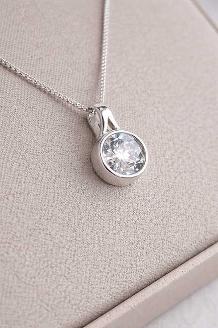 Secretly Set Circle Pendant