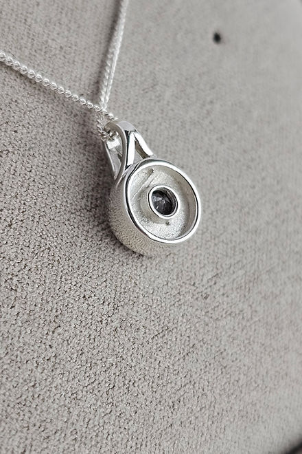 Secretly Set Circle Pendant