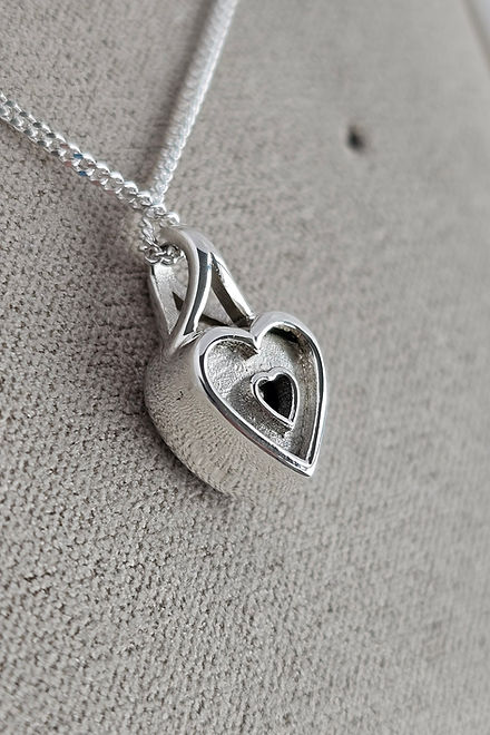 Secretly Set Heart Pendant